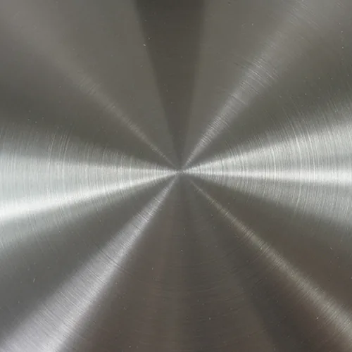 Surface brossée du plateau inox AISI 304 amovible et rotatif de la balance LAB-V1 en gros plan
